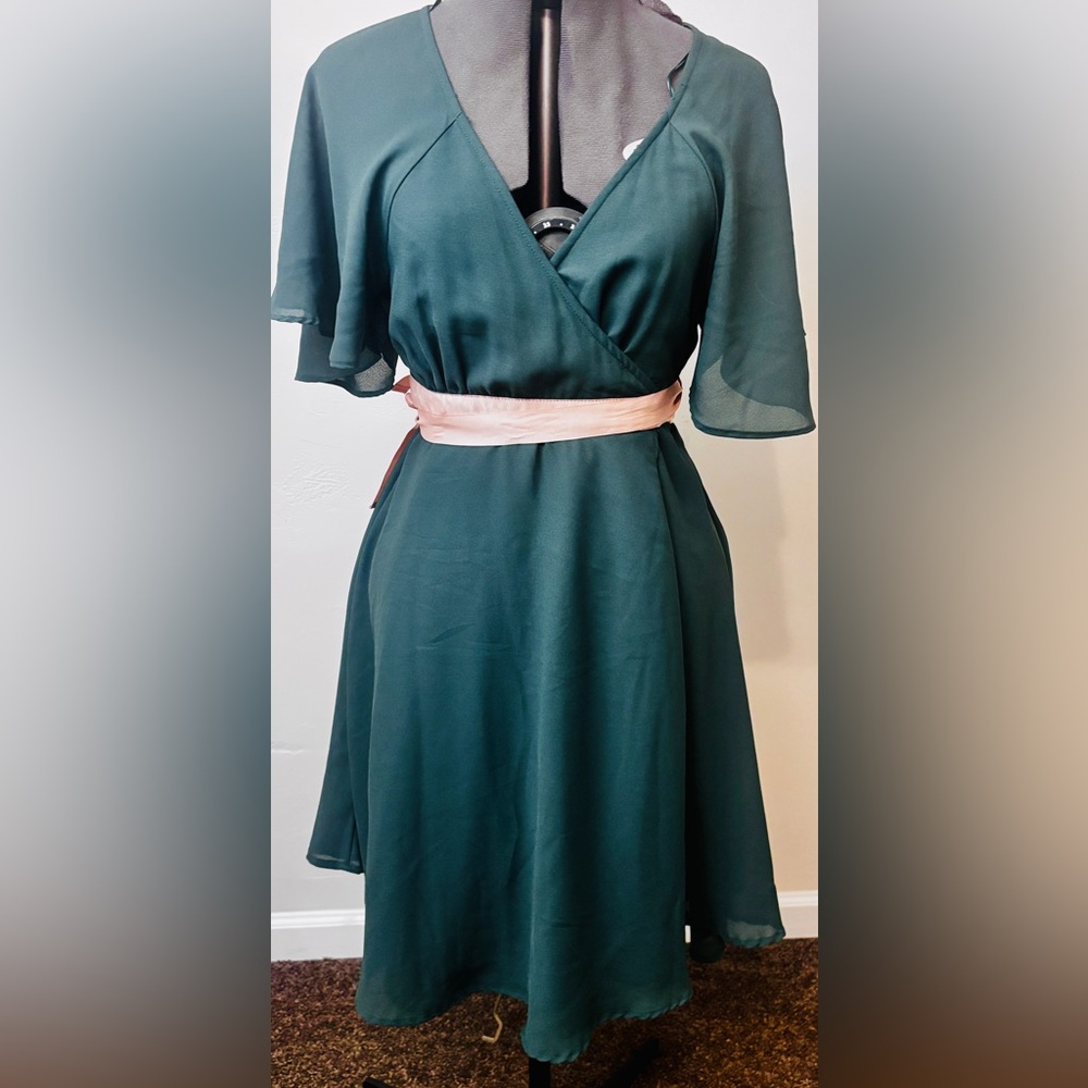H&M Green wrap midi dress with flutter sleeves.